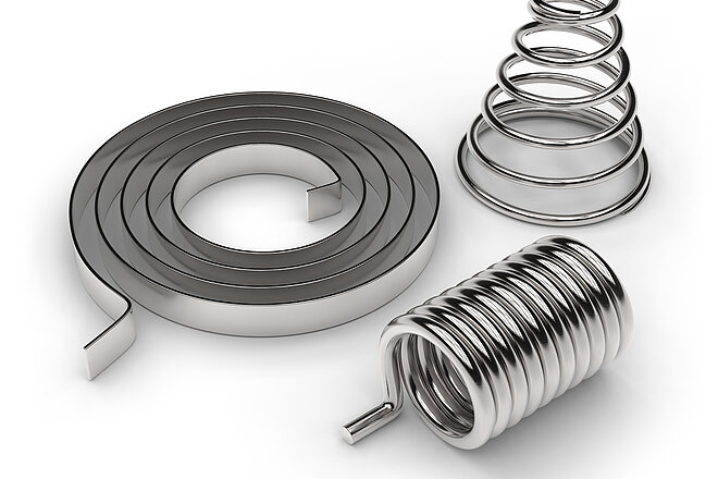 Federn - Metallische Werkstücke, die sich elastisch verformen lassen, z. B. Schraubenfedern